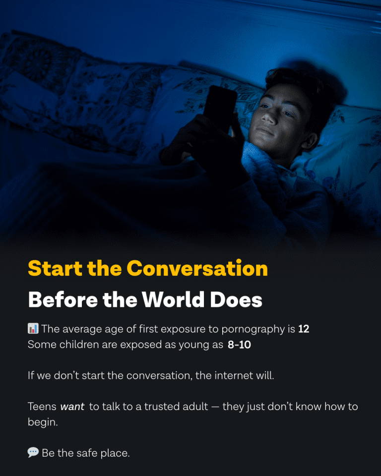 Boy in the dark in bed looking at phone, how to have healthy conversations about porn with your teens