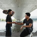 skateboard guys underpass doing a fist bump non sexual touch and porn recovery